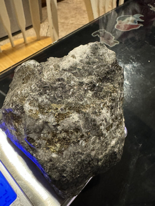 Natural black rock with gold / Weighs : 2 + Pounds