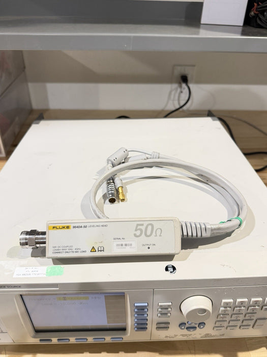 FLUKE 9640A RF REFERENCE SOURCE WITH 9640A-50 LEVELING HEAD TESTED
