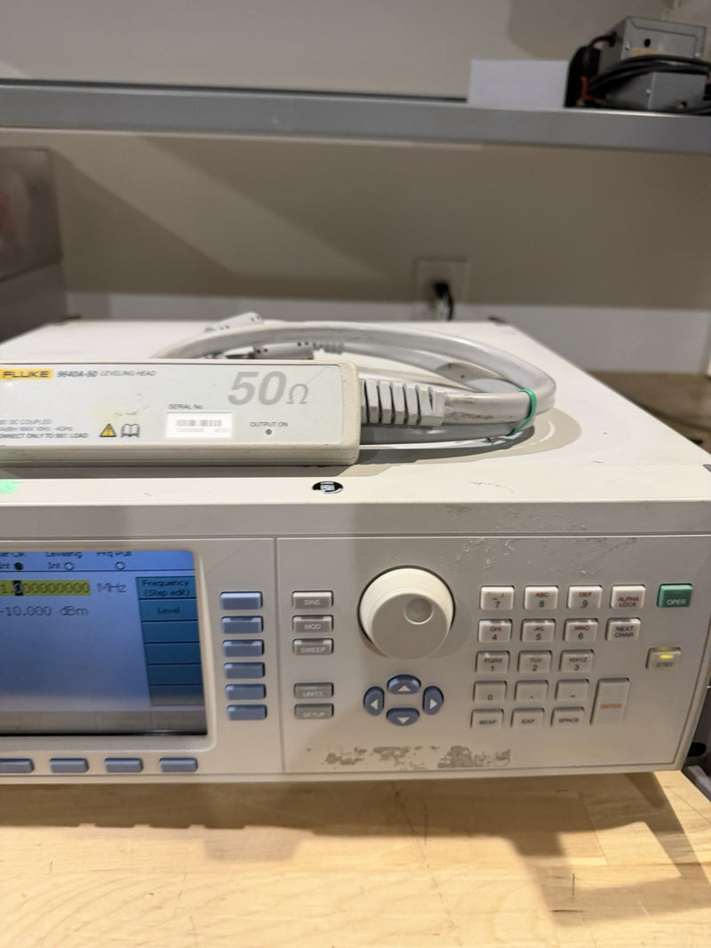 FLUKE 9640A RF REFERENCE SOURCE WITH 9640A-50 LEVELING HEAD TESTED