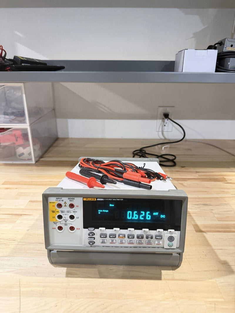 FLUKE 8808A 5.5 DIGITAL MULTIMETER WITH LEADS & CHARGER TESTED