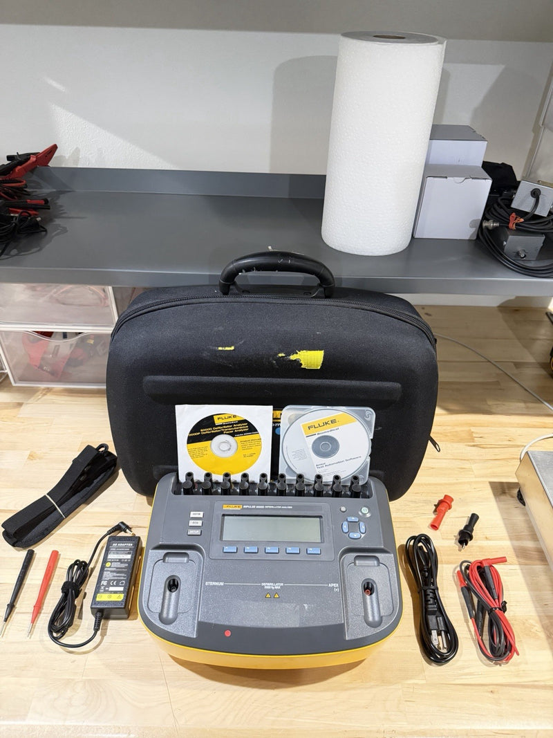 FLUKE BIOMEDICAL IMPULSE 6000D ANALYZER W LEADS & CHARGER TESTED