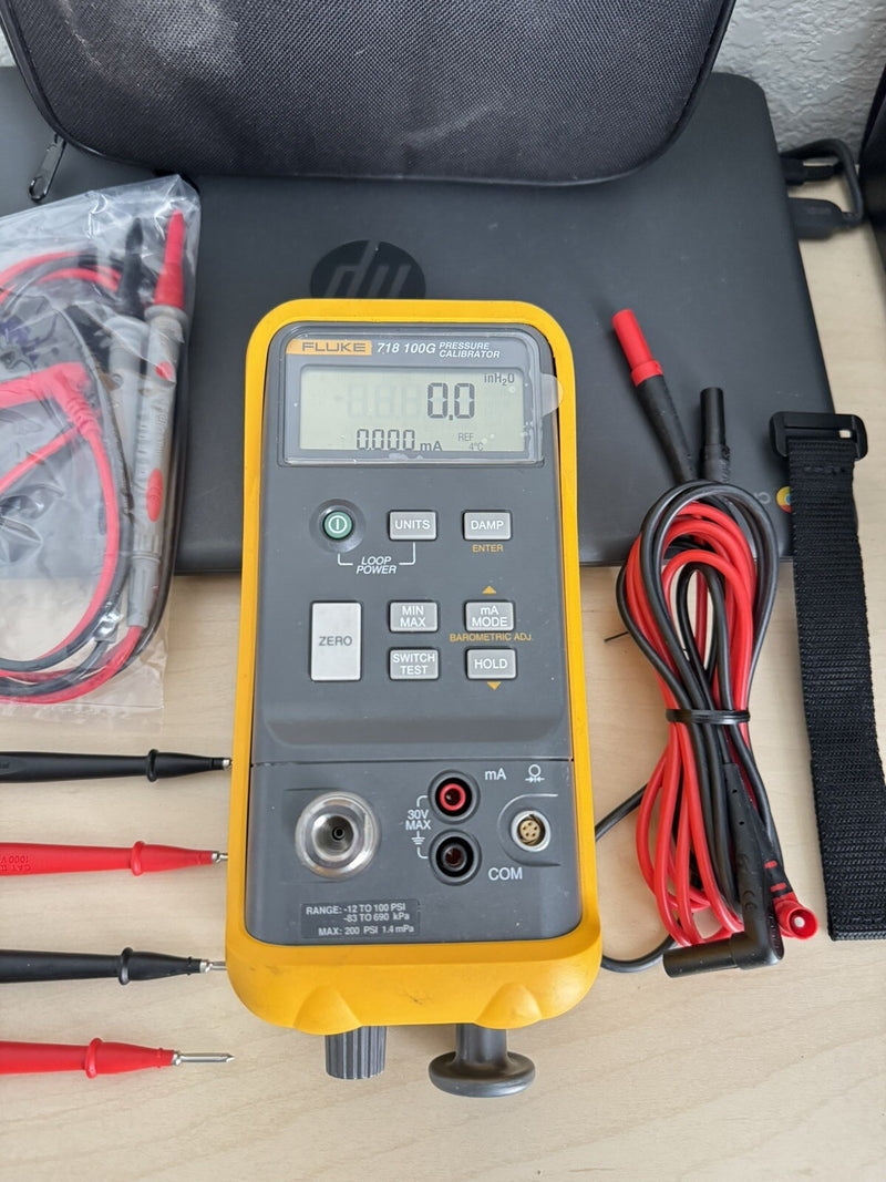 FLUKE 718 100G -12 TO 100PSI HAND PUMP PRESSURE VACUUM CALIBRATOR