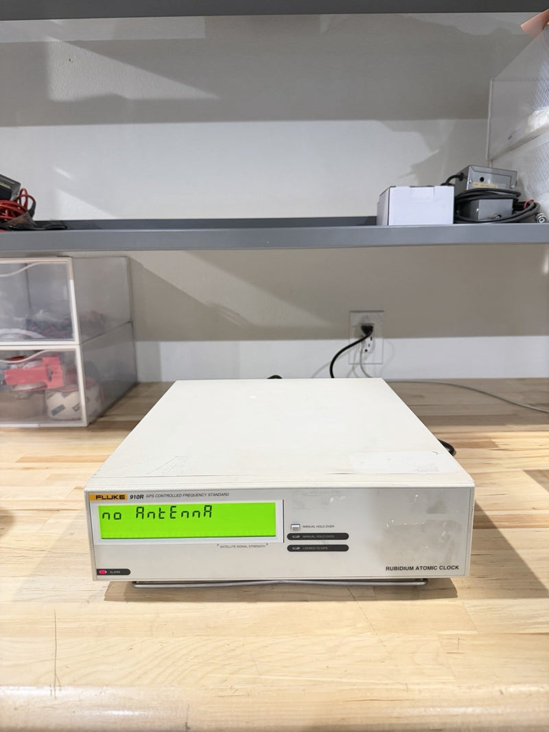 FLUKE 910R GPS CONTROLLED FREQUENCY STANDARD TESTED