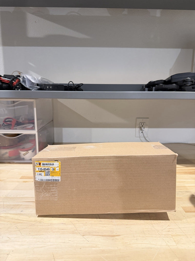 CAT 115-0549 EXHAUST MANIFOLD (NEW SEALED) SHIPS FREE