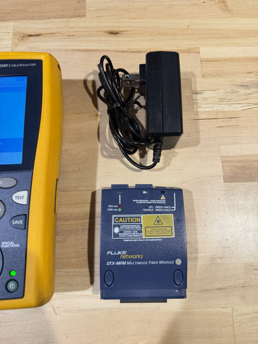 FLUKE NETWORKS DTX-1200 MAINFRAME & FIBER MODULE WITH CHARGER TESTED
