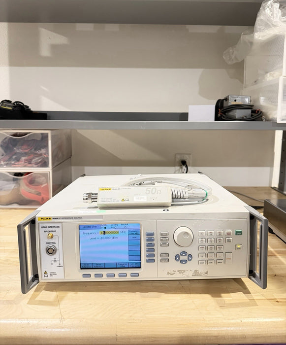 FLUKE 9640A RF REFERENCE SOURCE WITH 9640A-50 LEVELING HEAD TESTED