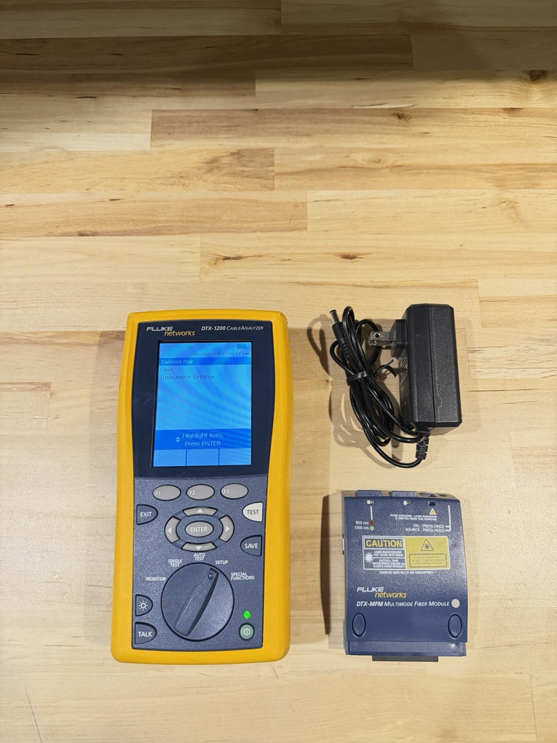 FLUKE NETWORKS DTX-1200 MAINFRAME & FIBER MODULE WITH CHARGER TESTED
