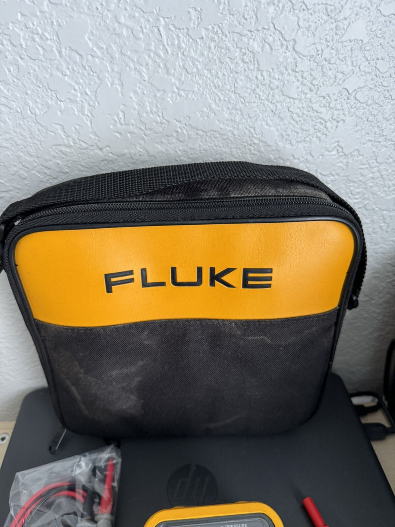 FLUKE 718 100G -12 TO 100PSI HAND PUMP PRESSURE VACUUM CALIBRATOR