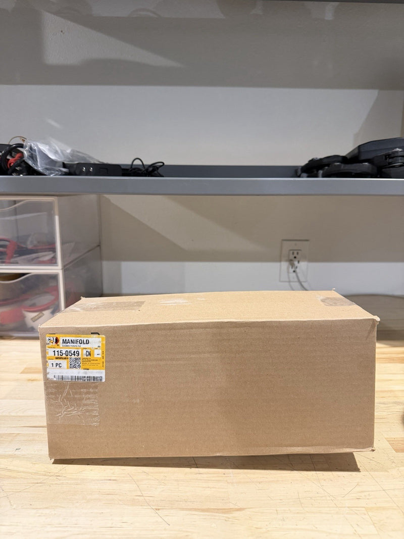 CAT 115-0549 EXHAUST MANIFOLD (NEW SEALED) SHIPS FREE