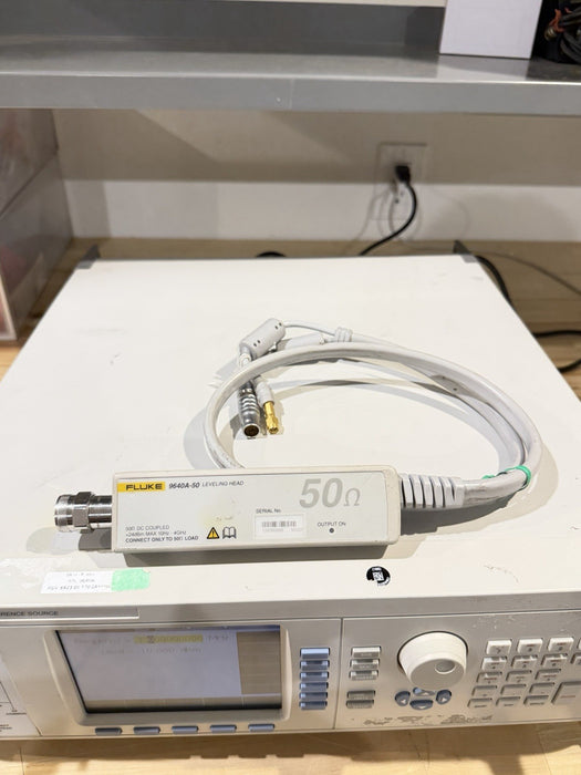 FLUKE 9640A RF REFERENCE SOURCE WITH 9640A-50 LEVELING HEAD TESTED