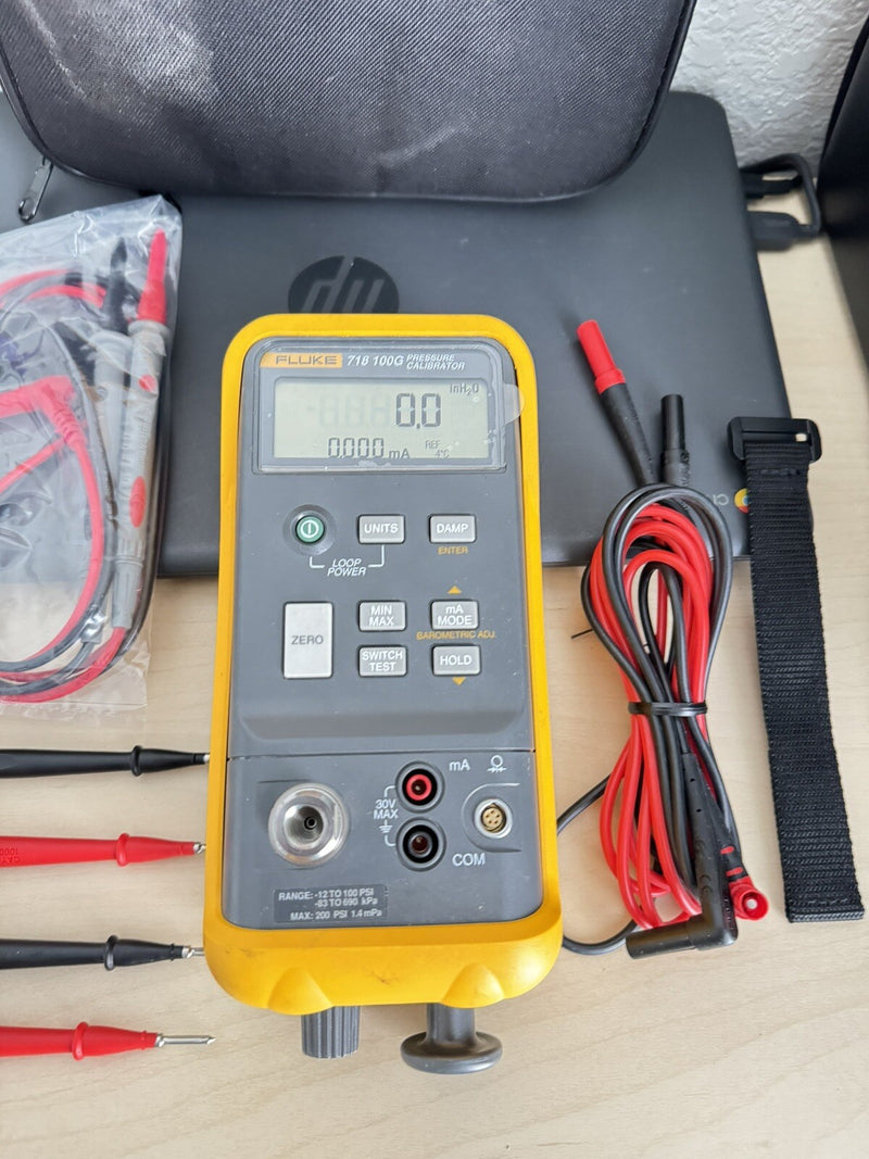 FLUKE 718 100G -12 TO 100PSI HAND PUMP PRESSURE VACUUM CALIBRATOR