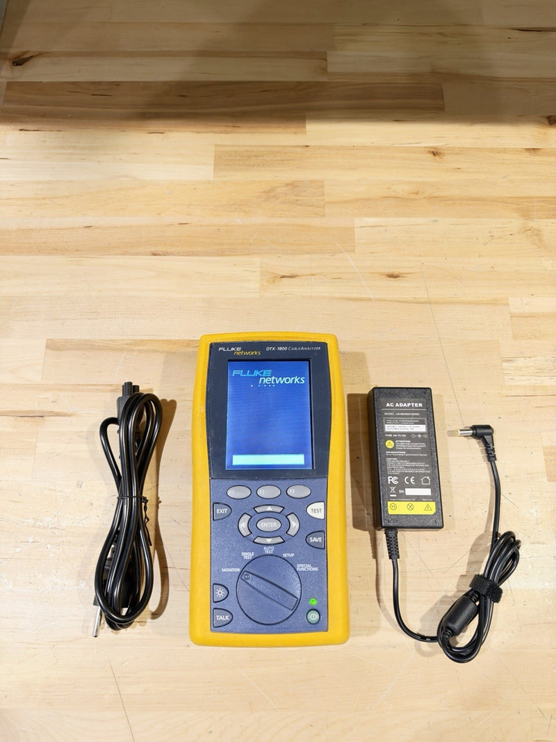FLUKE NETWORKS DTX-1800 MAINFRAME & W/ CHARGER (PARTS ONLY) FOR PARTS