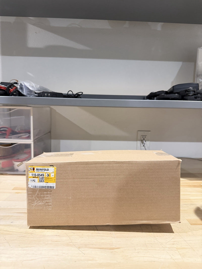 CAT 115-0549 EXHAUST MANIFOLD (NEW SEALED) SHIPS FREE