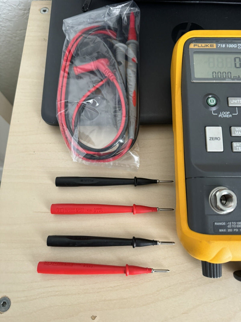 FLUKE 718 100G -12 TO 100PSI HAND PUMP PRESSURE VACUUM CALIBRATOR