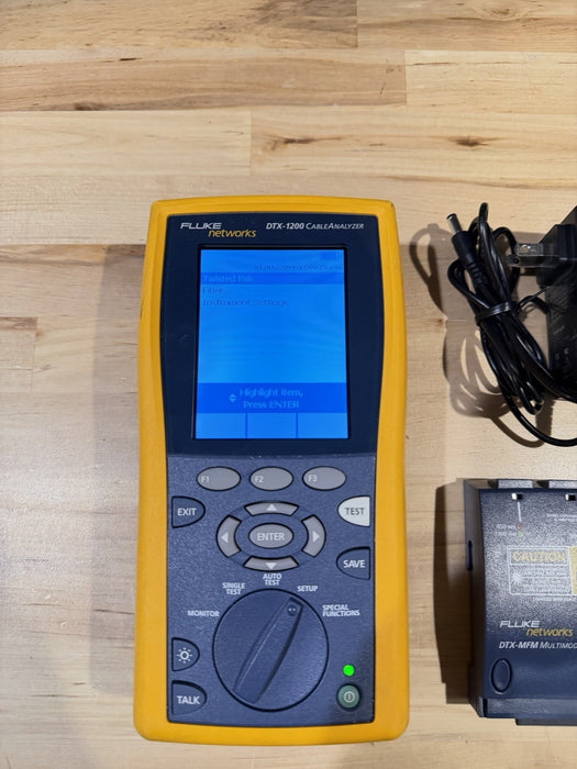 FLUKE NETWORKS DTX-1200 MAINFRAME & FIBER MODULE WITH CHARGER TESTED