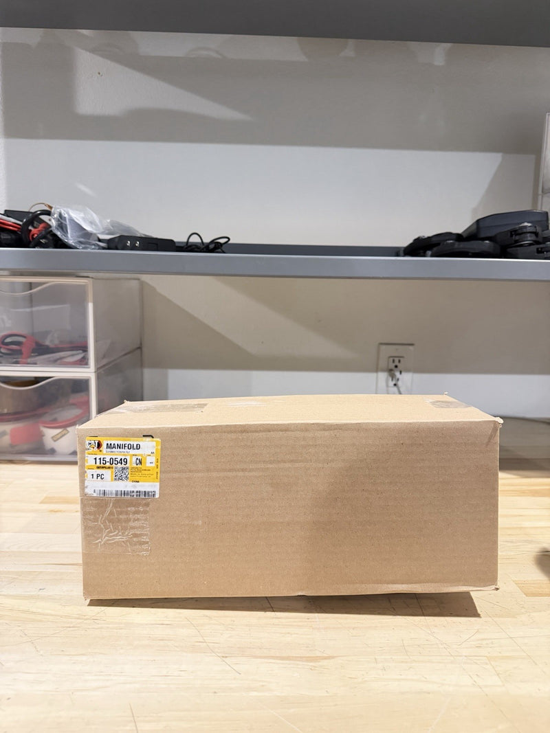 CAT 115-0549 EXHAUST MANIFOLD (NEW SEALED) SHIPS FREE