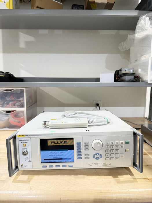 FLUKE 9640A RF REFERENCE SOURCE WITH 9640A-50 LEVELING HEAD TESTED