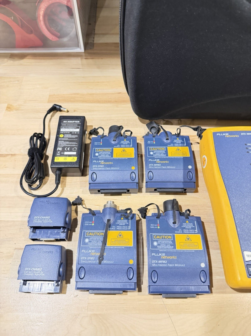 FLUKE NETWORKS DTX-1800 CABLE ANALYZER WITHDTX-SFM2 DTX-MFM2 DTX-PLA002 TESTED