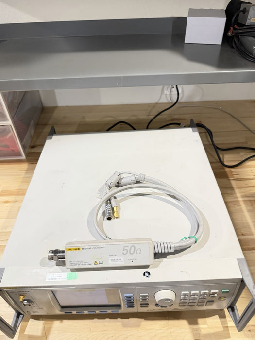 FLUKE 9640A RF REFERENCE SOURCE WITH 9640A-50 LEVELING HEAD TESTED