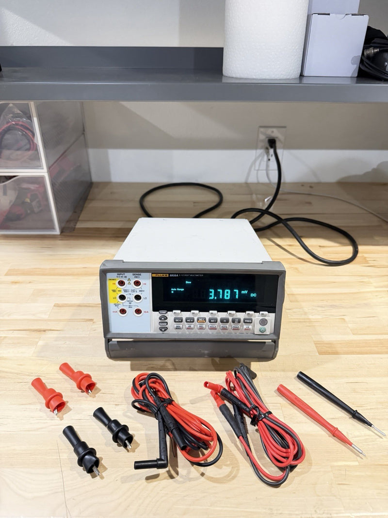 FLUKE 8808A 5.5 DIGITAL MULTIMETER WITH LEADS & CHARGER TESTED