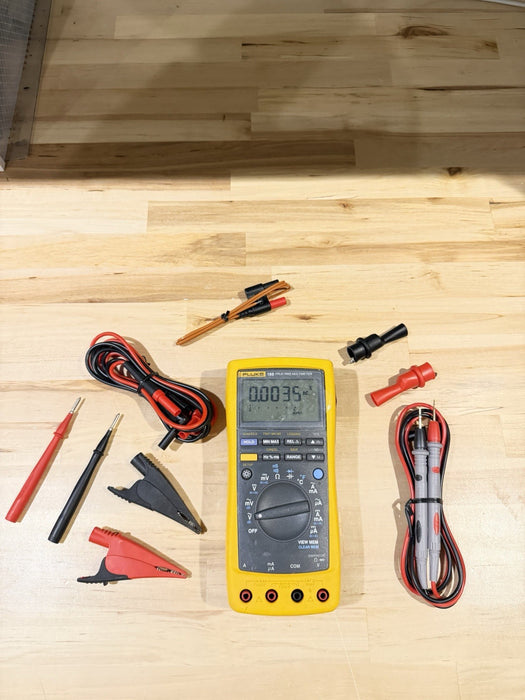 FLUKE 189 TRUE RMS MULTIMETER WITH LEADS AND CLIPS USED