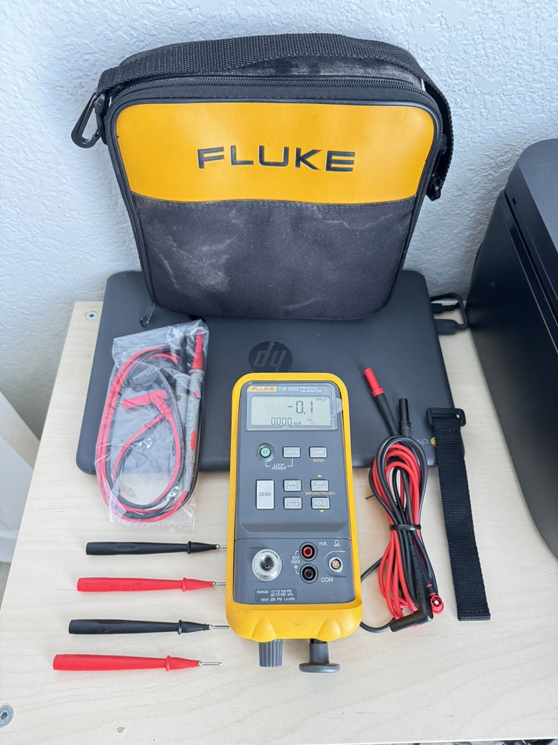 FLUKE 718 100G -12 TO 100PSI HAND PUMP PRESSURE VACUUM CALIBRATOR