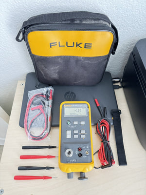 FLUKE 718 100G -12 TO 100PSI HAND PUMP PRESSURE VACUUM CALIBRATOR