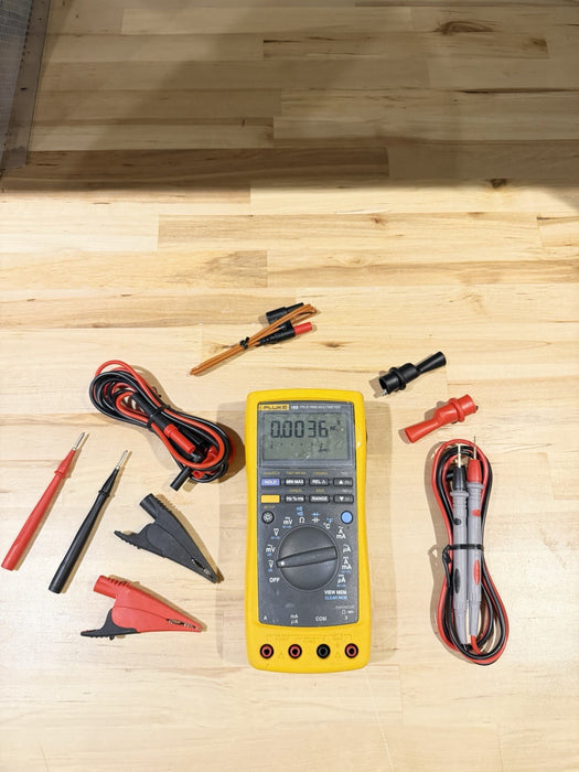 FLUKE 189 TRUE RMS MULTIMETER WITH LEADS AND CLIPS USED